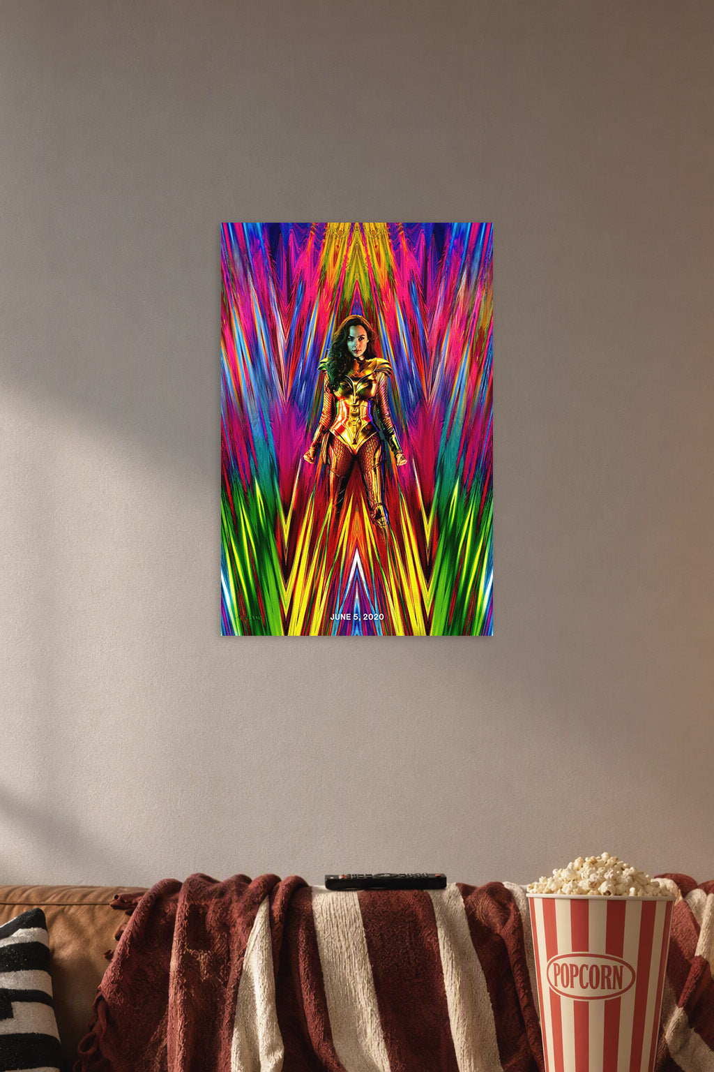 Wonder Woman in a cozy movie room above a brown sofa with popcorn.