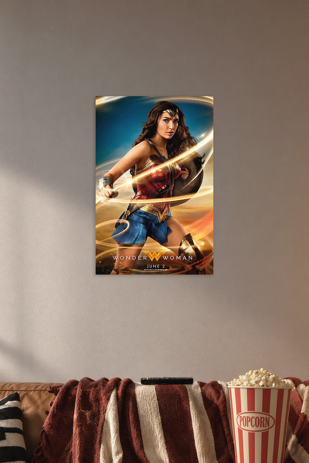 Wonder Woman in a cozy movie room above a brown sofa with popcorn.