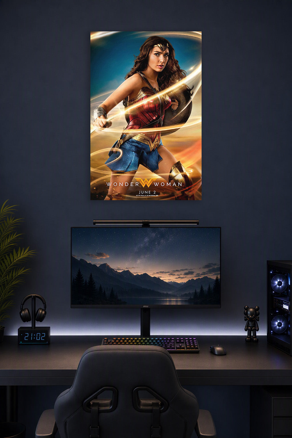 Wonder Woman in a gaming desk setup above a monitor.