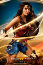Wonder Woman poster features the armored heroine with shield and glowing lasso against a blue and fiery orange sky.