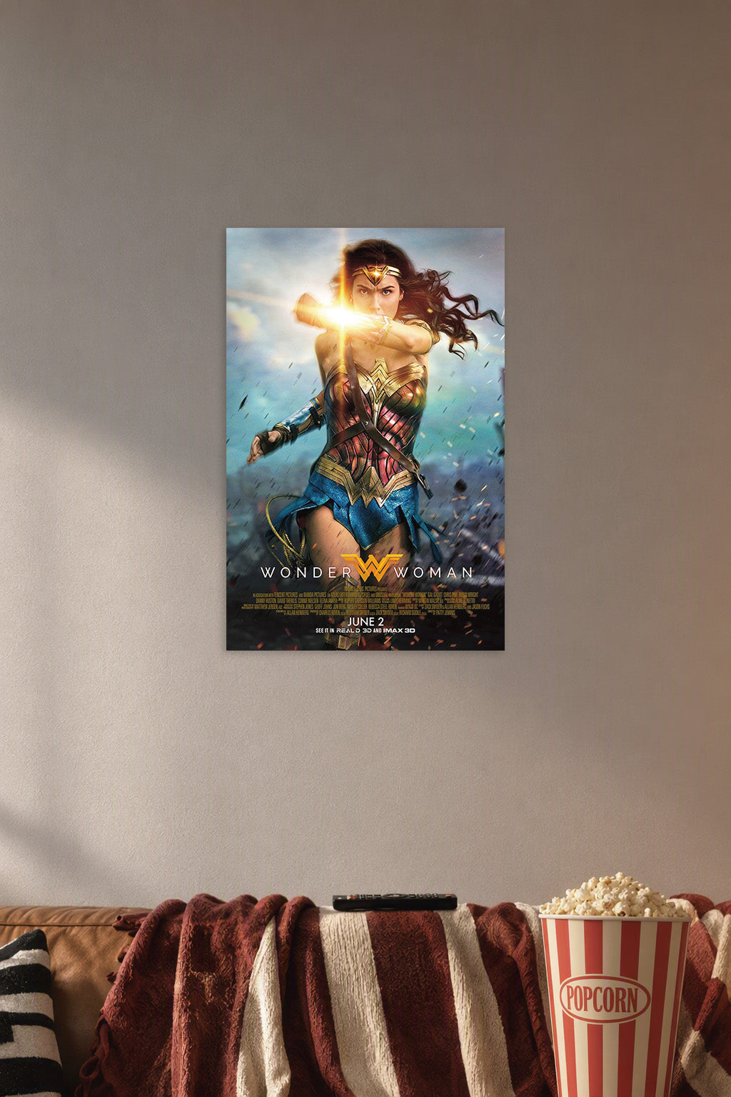 Wonder Woman in a cozy movie room above a brown sofa with popcorn.