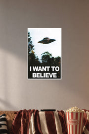 X-Files UFO 'I Want to Believe' in a cozy movie room above a brown sofa with popcorn.