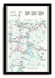 Yellowstone National Park framed wall art print features a detailed map of roads, lakes, forests, visitor centers, and campground symbols.