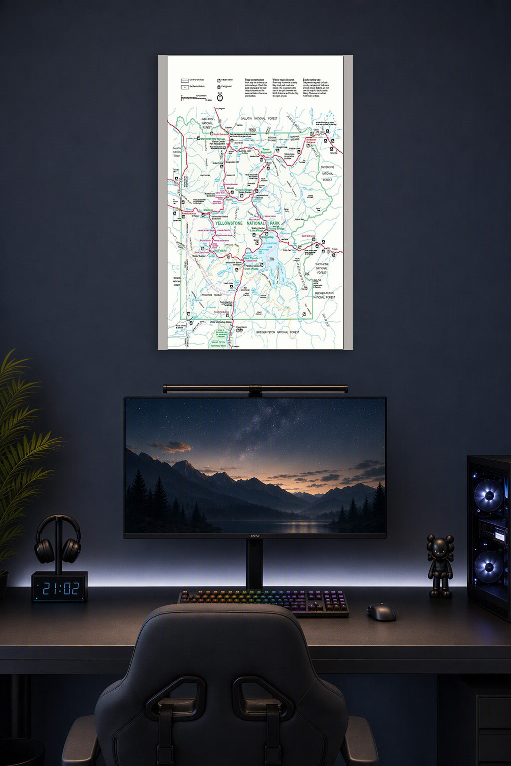 Yellowstone National Park Map in a gaming desk setup above a monitor.