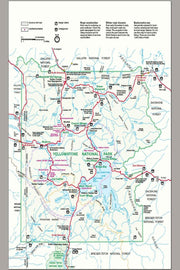 Yellowstone National Park wall art print displays a detailed road map with blue waterways, red routes, green boundaries, and visitor icons.