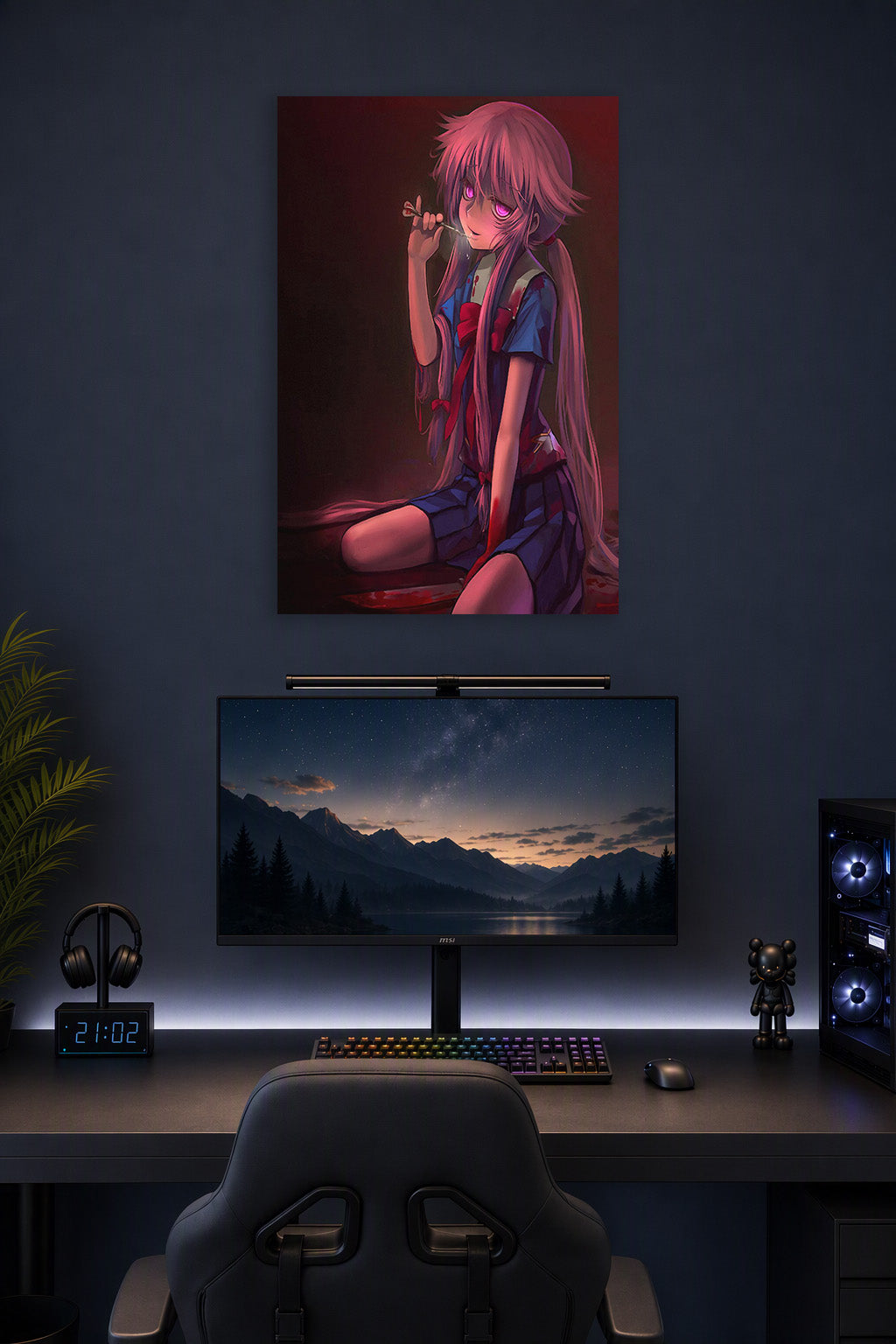 Yuno Gasai in a gaming desk setup above a monitor.
