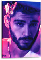 Zayn Malik canvas wall art print featuring a close-up portrait with dark hair, beard, earrings, and purple-pink lighting.