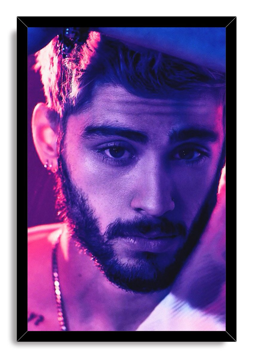 Zayn Malik framed wall art print featuring a neon purple and pink close-up portrait set in a slim black frame.