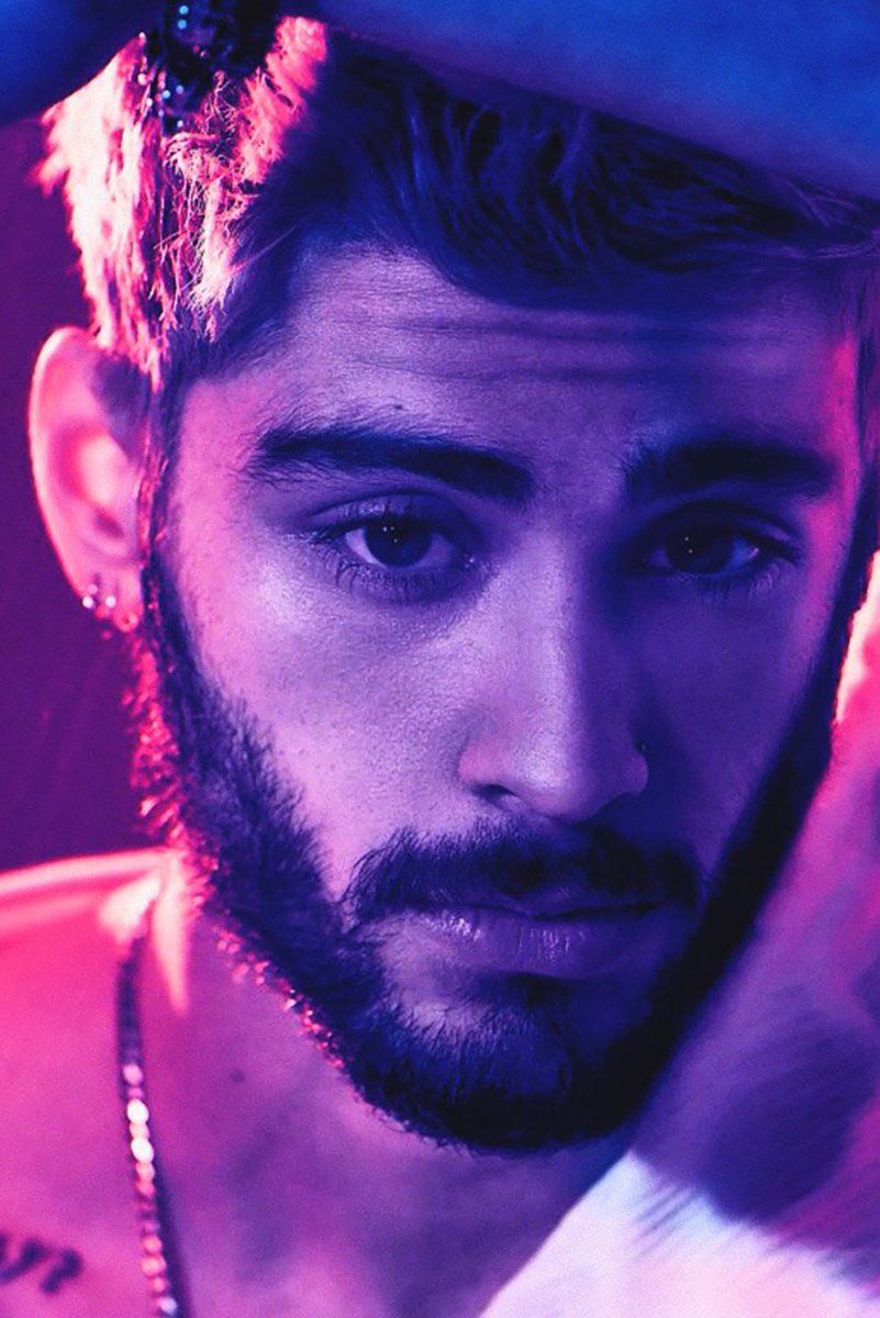 Zayn Malik wall art print with a close-up bearded portrait in vivid purple, blue, and pink neon lighting.