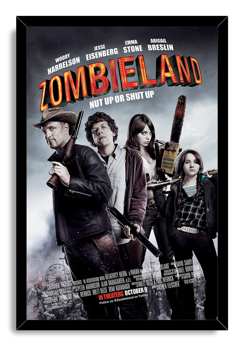 Zombieland framed wall art print with four armed characters, bold red title lettering, and zombie silhouettes at the bottom.