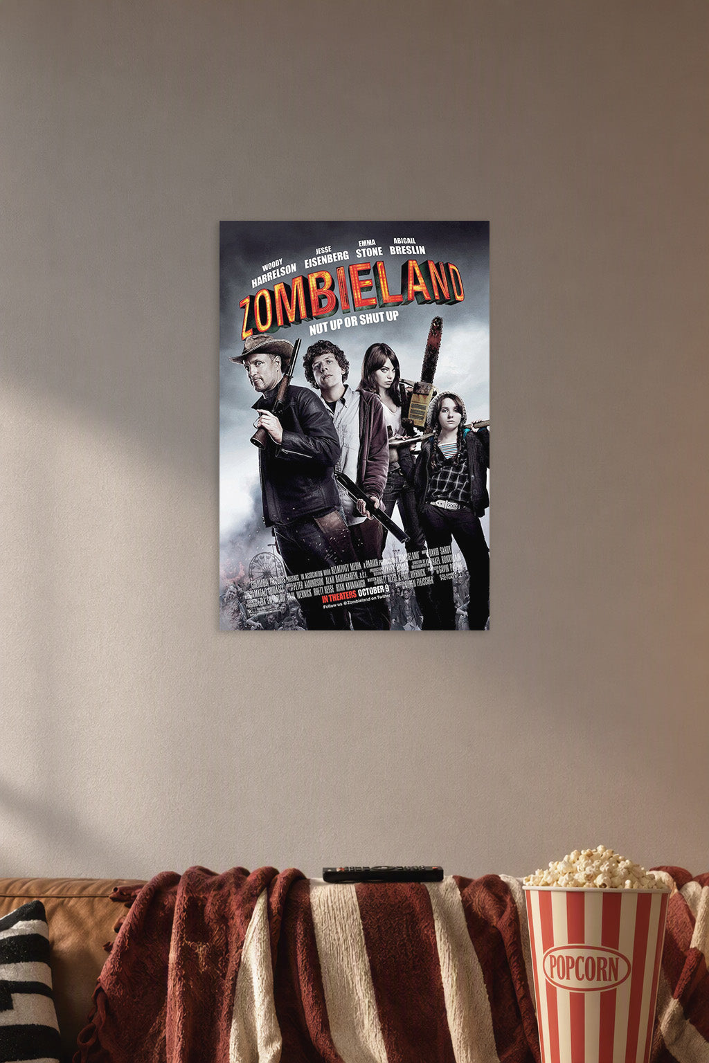 Zombieland Movie Cast in a cozy movie room above a brown sofa with popcorn.