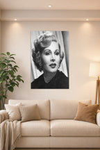 Zsa Zsa Gabor in a bright living room above a beige sofa.