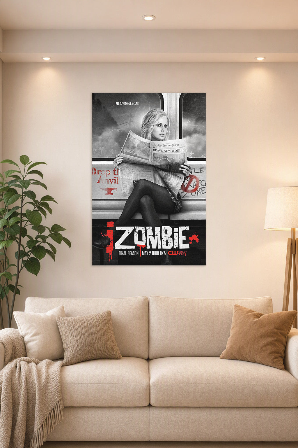 iZombie Liv Moore TV Series Poster in a bright living room above a beige sofa.