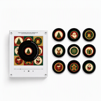 White Christmas NFC magnetic music player with a holiday art panel, one mounted black disc, and nine illustrated discs for tree, Santa, bell, reindeer, snowflake, gift, stocking, g